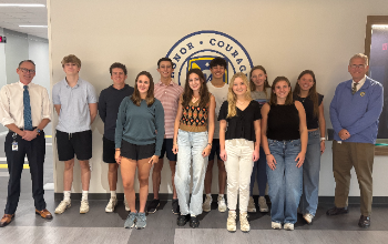 10 MHS National Merit Scholars with Superintendent Estepp and Dr. Renner