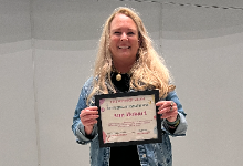 Ann Hobart with award