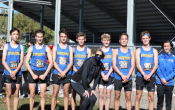 boys cross country team and coach