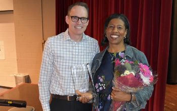 Ericka Simmons receiving an award