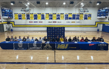 student athletes and families on signing day