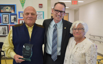 Jack Smith receiving an award