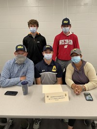 student with family at signing day