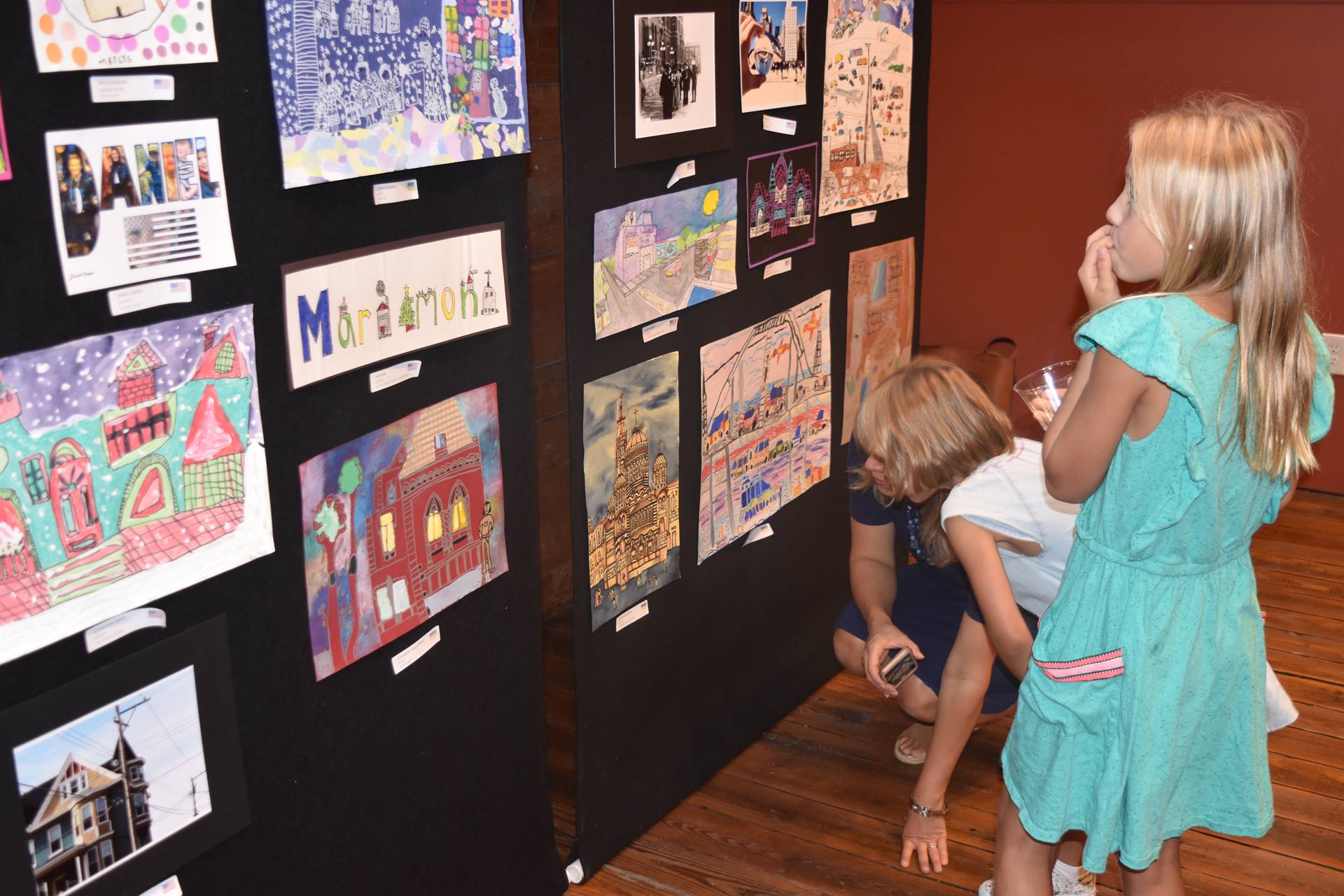 students looking at art