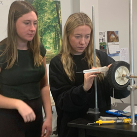 students working on physics project